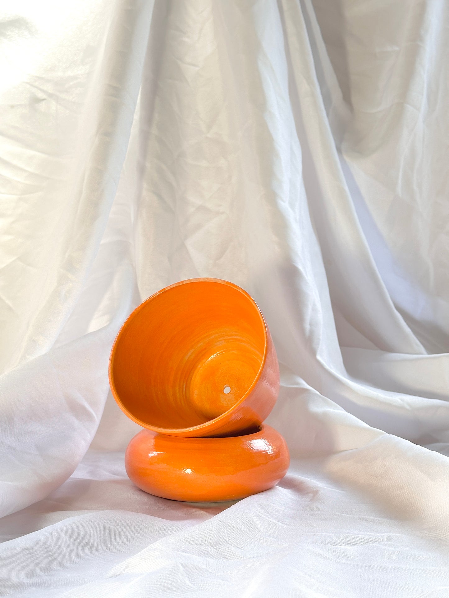 orange tiered plant pot