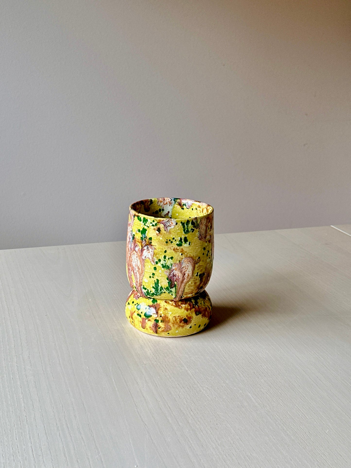 green tiered plant pot