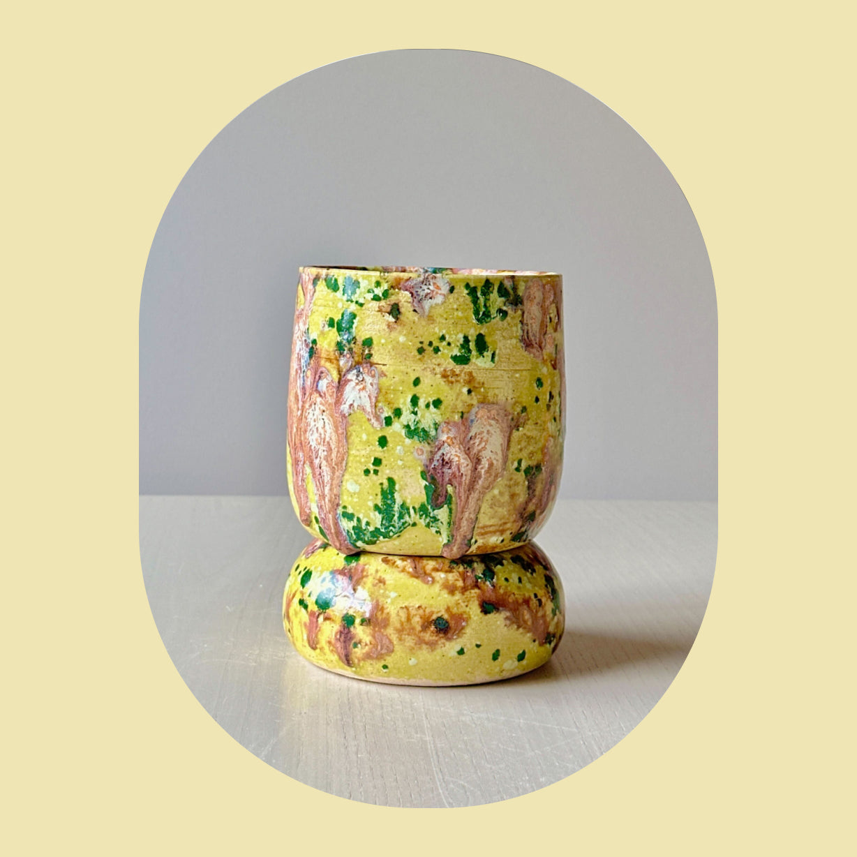 green tiered plant pot