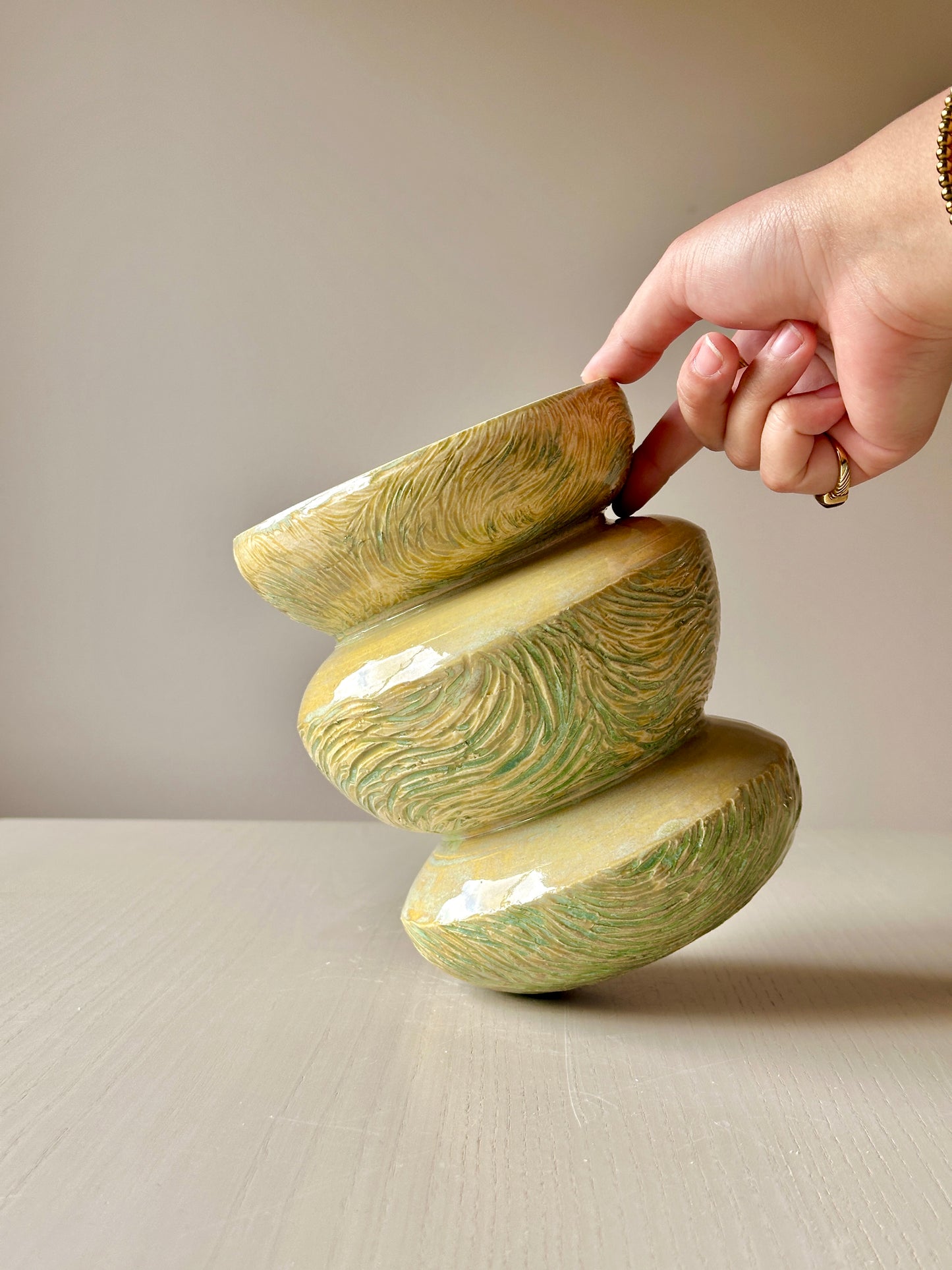 carved green vase
