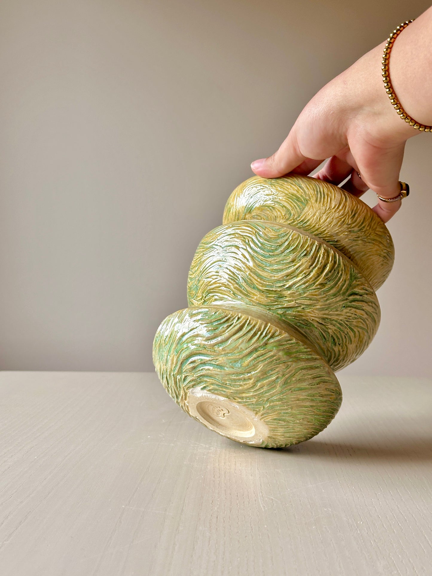 carved green vase